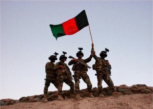 Afghan commandos raising their nation's flag over Kuh-e Musa Qala on Oct. 17, 2013, in Washer district, Helmand province, Afghanistan. SPECIAL OPERATION 7th Special Operations Kandak.  (3)