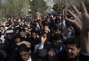 Kabul University students shout anti-U.S. slogans during a protest against the burning of a Koran supervised by Florida-based militant fundamentalist Christian preacher Terry Jones, in Kabul
