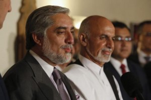 Afghanistan's presidential candidate Abdullah addresses a news conference with rival Ghani as they announced a deal for the auditing of all Afghan election votes at the United Nations Compound in Kabul