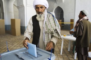 A man casts his vote at a polling station in Herat, western Afghanistan