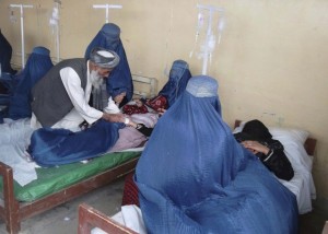 Schoolgirls who fell ill after smelling gas at their school, receive treatment at a hospital in Takhar province, Afghanistan