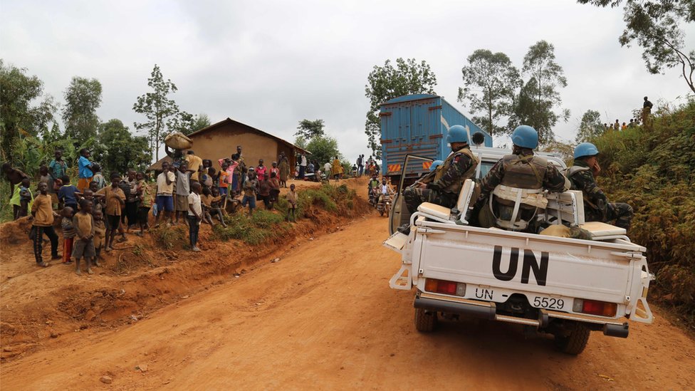 Moroccan soldiers from the UN mission in DRC ride in a vehicle as they patrol in the violence-torn Djugu territory in eastern DRC