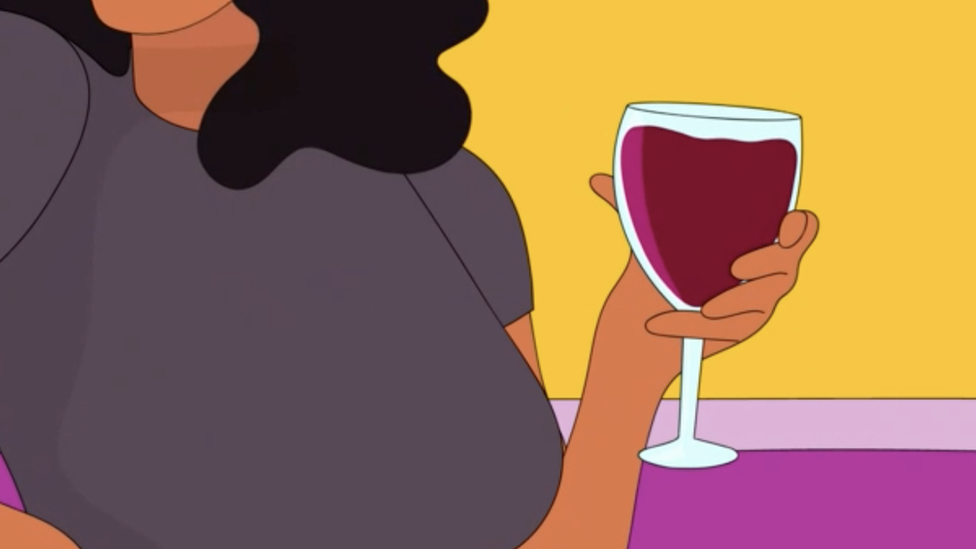 زنی با لیوان شراب