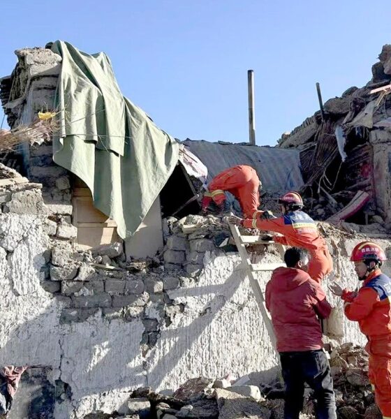 Rescue workers dig for survivors of Tibet Earthquake